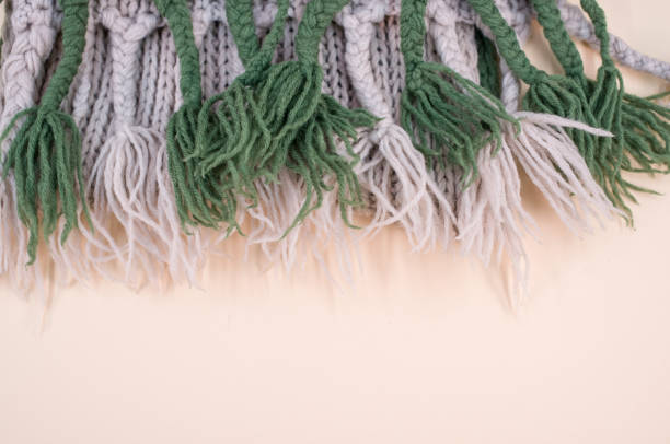 istock knitted soft natural wool on a beige background 1454332669