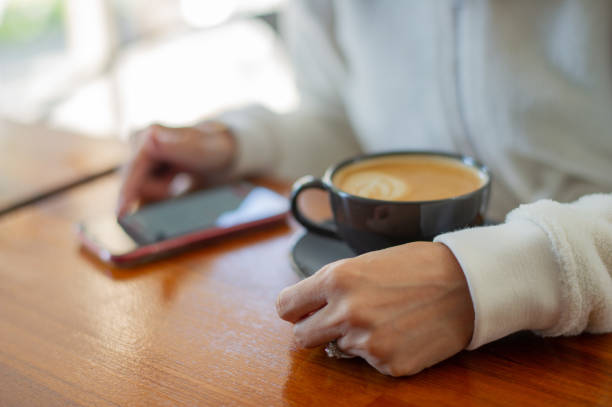 istock hot latte art coffee on wood table, relax time 1454333677