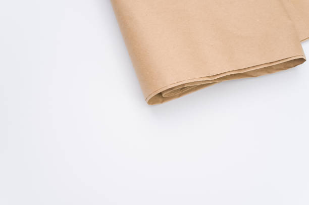 istock recycled brown Kraft paper folded on white background 1454333787