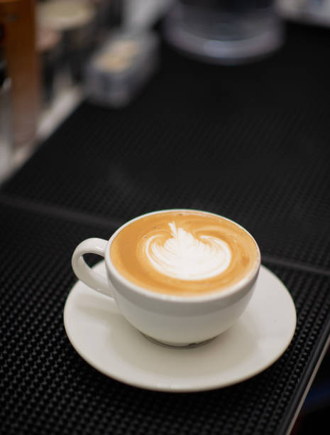 istock hot latte art coffee on table, relax time 1454333808