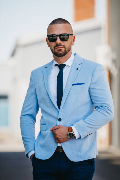 istock Vertical shot of a handsome young man in a suit with a business look 1454334607