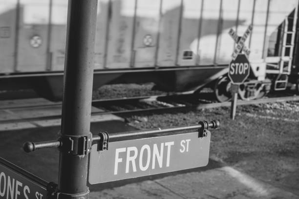 istock Grayscale shot of a front sign at a train station 1454334775