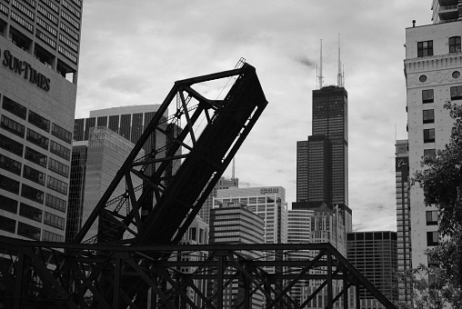 Chicafo, United States – June 21, 2009: A grayscale shot of the buildings near Chicago River near Ohio State, USA