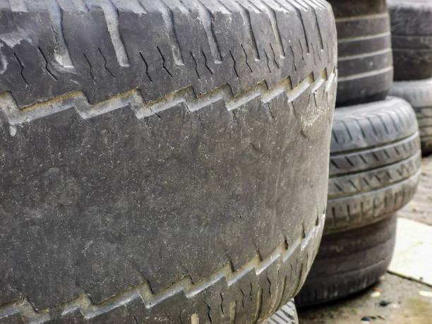 istock Close up image of worn out rubber tyre with textures. Selective focus. 1454335184