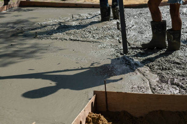 istock Workers are pouring, concrete and equipment 1454335919