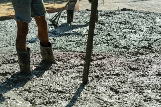 istock Workers are pouring, concrete and equipment 1454335924