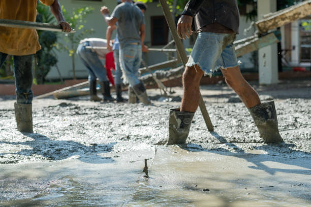 istock Workers are pouring, concrete and equipment 1454335927