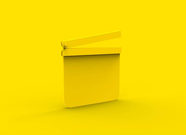 istock 3d object yellow claquette tool in monotonous yellow background 1454336188