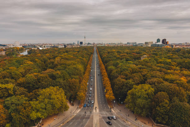 istock Road leading to Victory Column along autumn trees in Berlin, Germany 1454338502