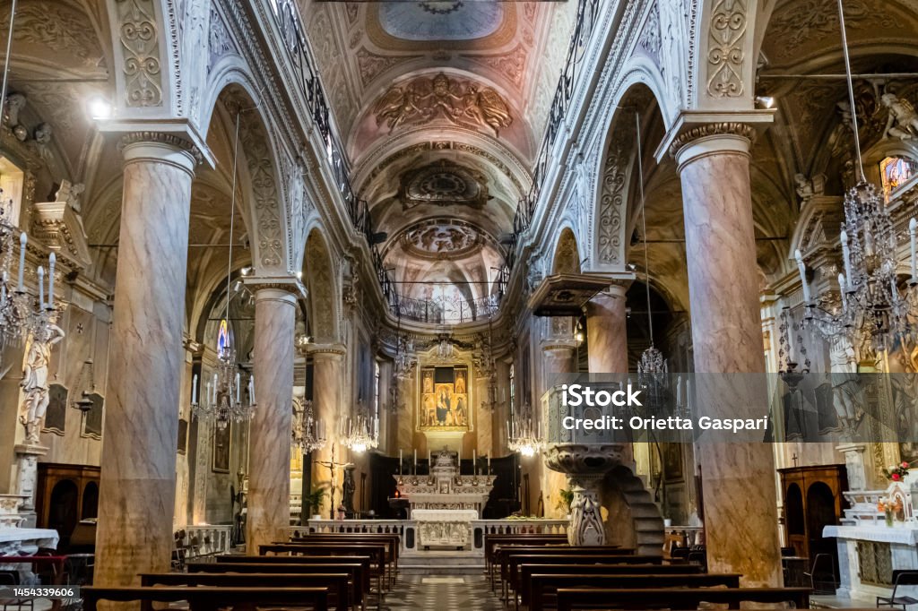 Interior of the Cathedral of Noli, a town in the province of Savona Nave of the Cathedral of Noli Architectural Column Stock Photo