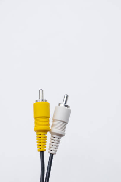 istock Vertical shot of a yellow and white cable jack isolated on white background 1454343763