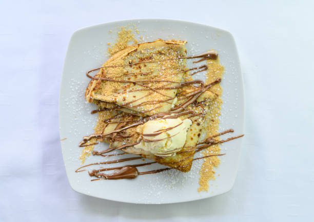 istock Crepes with ice cream served on a plate 1454344846