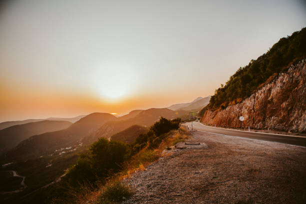 istock Road on the mountain on the sunset 1454347865