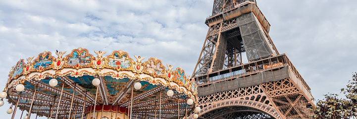 Carrousel and Eiffel Tower a day of Autumn inParis, France