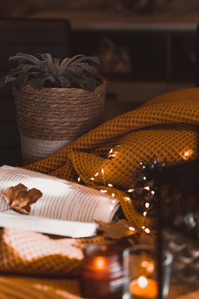 istock autumn photo on table with candles 1454360799
