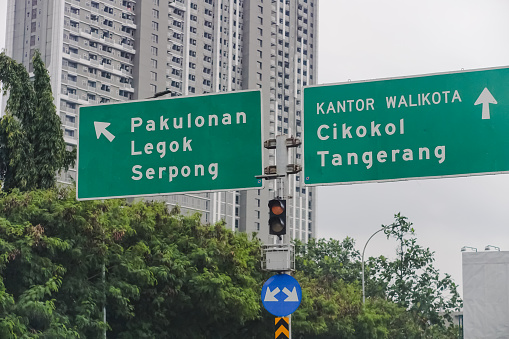 Tangerang, Indonesia - December 30, 2022 : Directional information boards on toll roads. Directions to the location of an area.