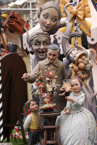 Valencia, Spain - March 18 2022. Traditional art festival with statues and monuments constructed with wood and papier mache, displayed in the streets and culminating in the burning. Celebrating Saint Joseph