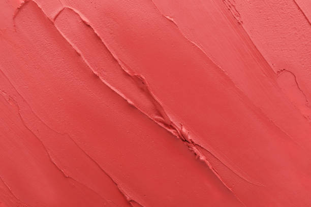 istock Texture of lipstick as background, top view 1454361779