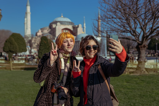 Young Tourists with view of Hagia Sophia, Sultanahmet District