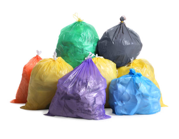 istock Trash bags full of garbage on white background 1454364290
