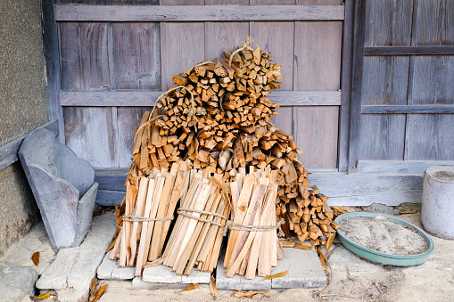 Firewood stacked in an old Japanese house