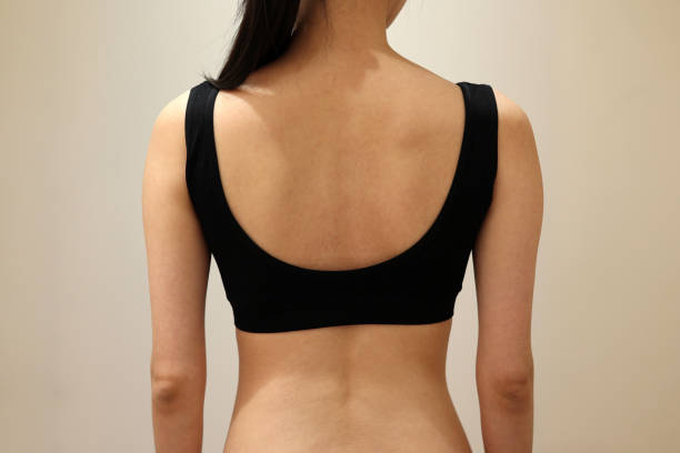 istock Woman's back with sportswear 1454367806