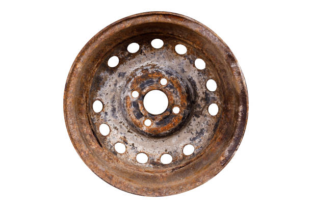 istock old rusty metal car rim isolated on white background. side view 1454369847