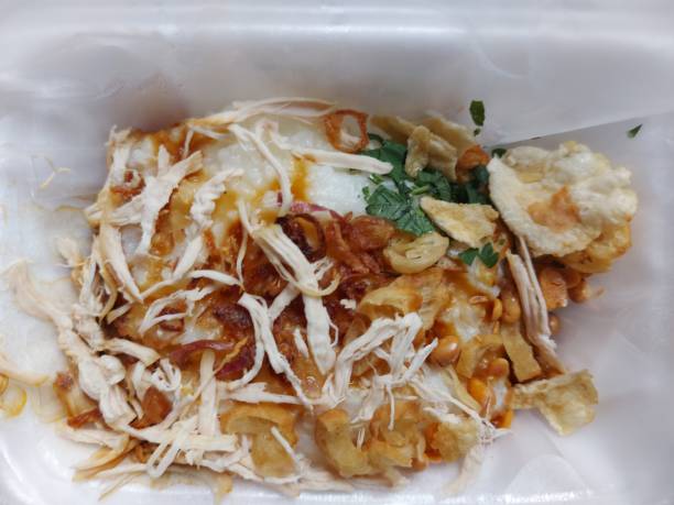 istock Bubur ayam. It is chicken porridge, authentic breakfast menu from indonesia 1454369996