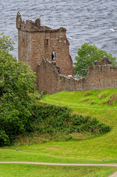Ruins of Urquhart Castle - Loch Ness - Scotland Scottish tourist attraction - Ruins of Urquhart Castle on the western shore of Loch Ness (site of many Nessie sightings) - Drumnadrochit, Highland, Scotland, United Kingdom - 1st of September 2012 drumnadrochit stock pictures, royalty-free photos & images