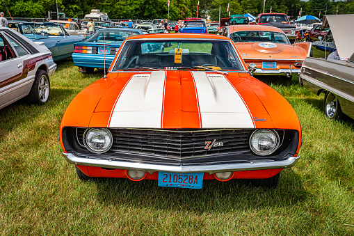 Iola, WI - July 07, 2022: High perspective front view of a 1969 Chevrolet Camaro Z28 Sport Coupe at a local car show.