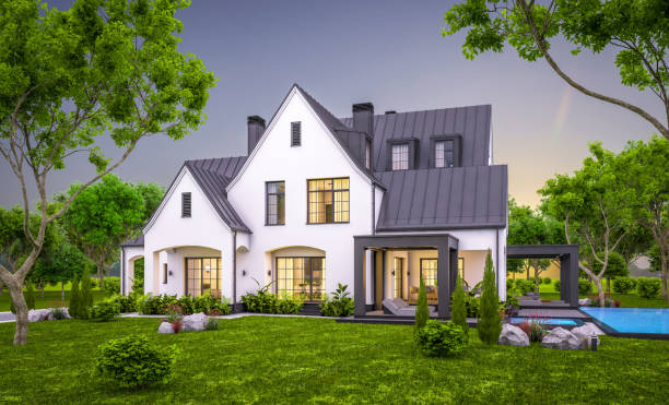 istock 3d rendering of white and black modern Tudor house in evening 1454374821