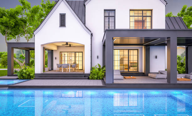 istock 3d rendering of white and black modern Tudor house in evening 1454374919