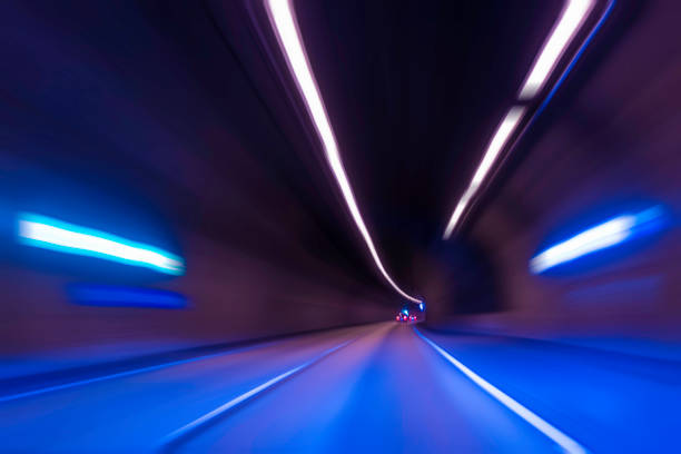 istock abstract blurred background of highway at night 1454375738