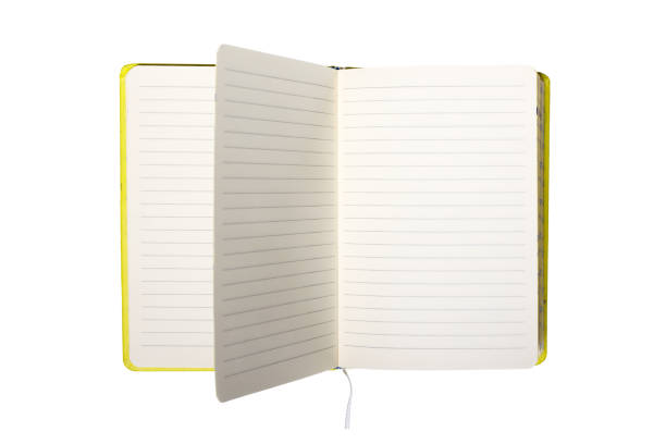 istock open notepad with yellow cover isolated on white background 1454375942