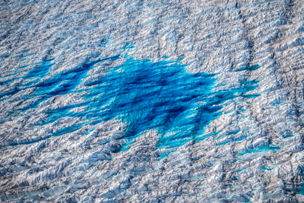 Aerial view of Jakobshavn Glacier also known as Ilulissat Glacier (Greenlandic: Sermeq Kujalleq), with giant blue water pool