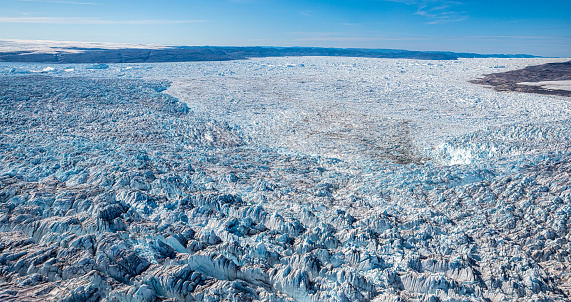 Aerial view of Jakobshavn Glacier also known as Ilulissat Glacier (Greenlandic: Sermeq Kujalleq), is a large outlet glacier in West Greenland. It is located near the Greenlandic town of Ilulissat and ends at the sea in the Ilulissat Icefjord.  The picture has been taken from a plane