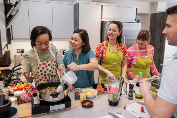 istock Adding the Coconut Milk to the Beef Curry 1454381652