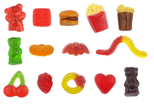 Assortment of different colorful gummy candies isolated on white background, candy collection