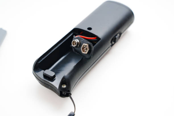 istock Ultrasonic dog repeller open without batteries on a white background. 1454385402