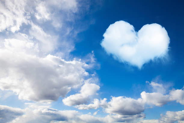 istock cumulus clouds on blue sky with heart shaped cloud 1454385416