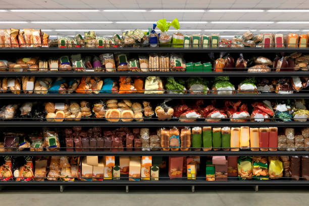 istock Bread stacked on supermarket shelves 1454386977