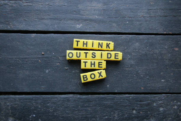 Think outside the box concept. Lettering on vintage background.