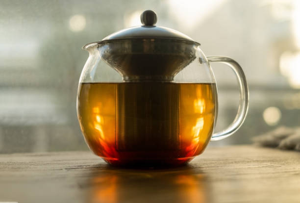 istock glass teapot with tea on a wooden table 1454388569