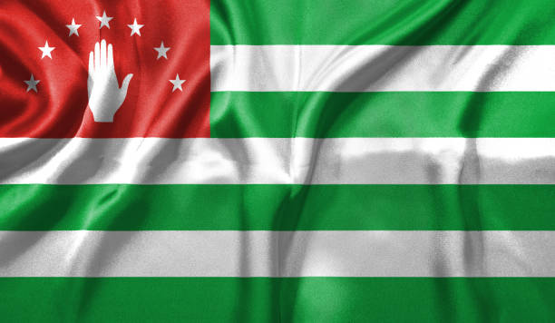 Abkhazia flag wave close up. Full page Abkhazia flying flag. Highly detailed realistic 3D rendering.