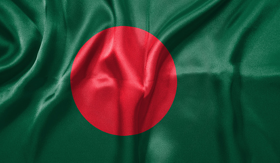 Bangladesh flag wave close up. Full page Bangladesh flying flag. Highly detailed realistic 3D rendering.