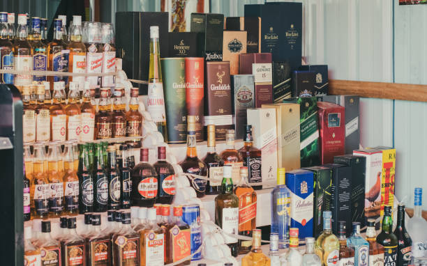 Liquor store in Myanmar A typical liquor store in Myanmar, where an assortment of liquor is sold under a small shack. liquor store counter photos stock pictures, royalty-free photos & images