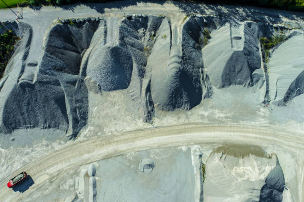 istock Mining Equipment working in an open pit Aggregates mine 1454401314