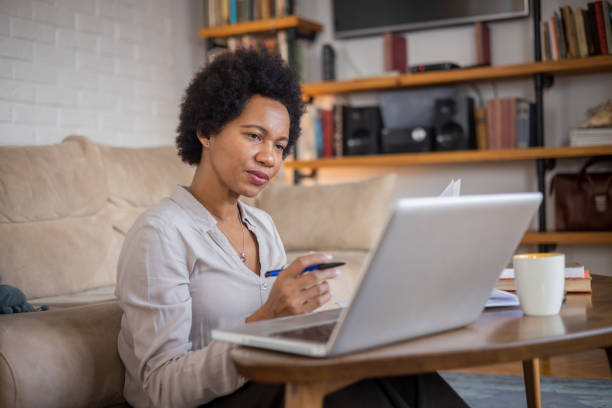 istock Woman working from home 1454401386
