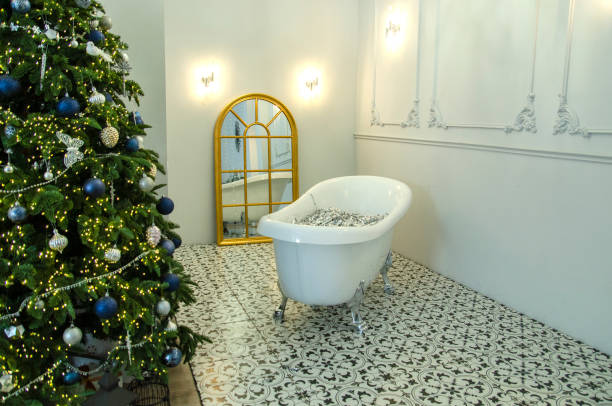 istock white bathroom with sparkles on the background of the Christmas tree, studio interior 1454402568