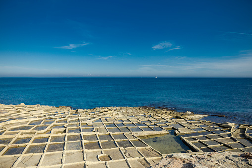 salt pans at malta island, europe.